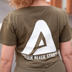 Back view of women's olive crop t-shirt with white Better Never Stops logo.