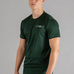 Men's forest green moisture wicking crewneck t-shirt with white logo.