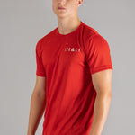 Men's red moisture wicking crewneck t-shirt with white logo.