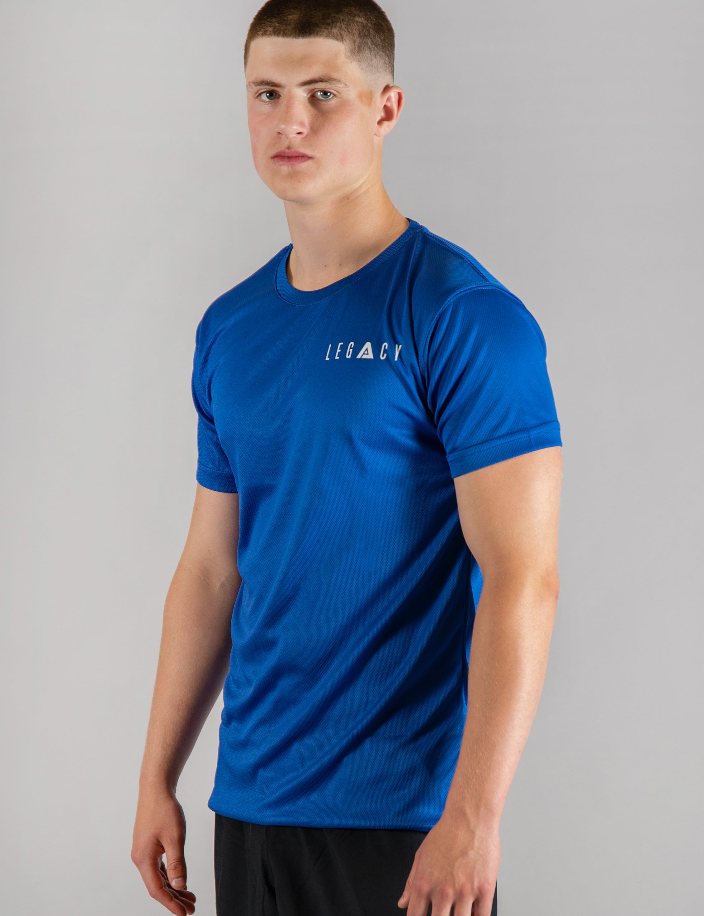 Men's blue moisture wicking crewneck t-shirt with white logo.