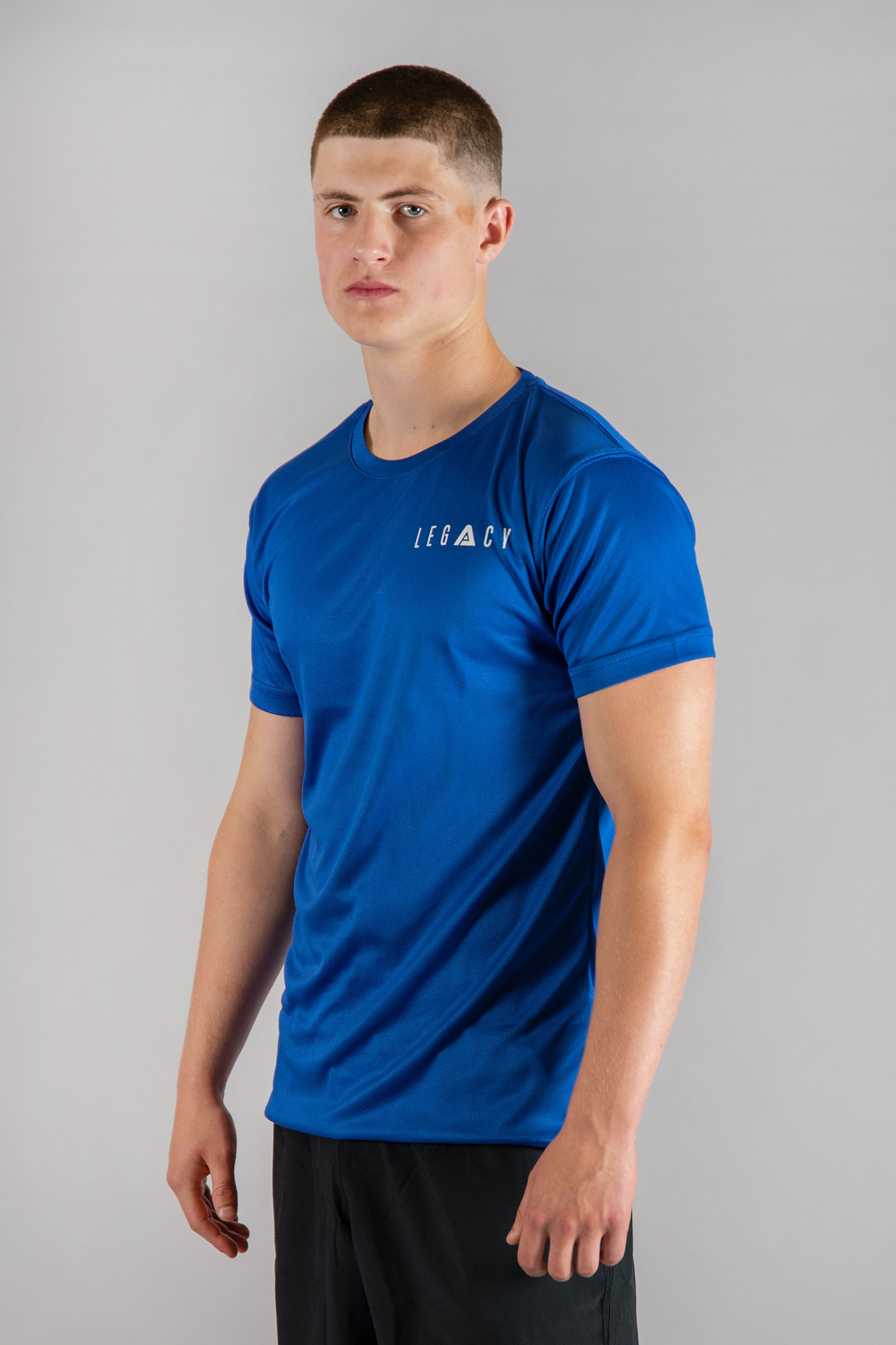 Men's blue moisture wicking crewneck t-shirt with white logo.