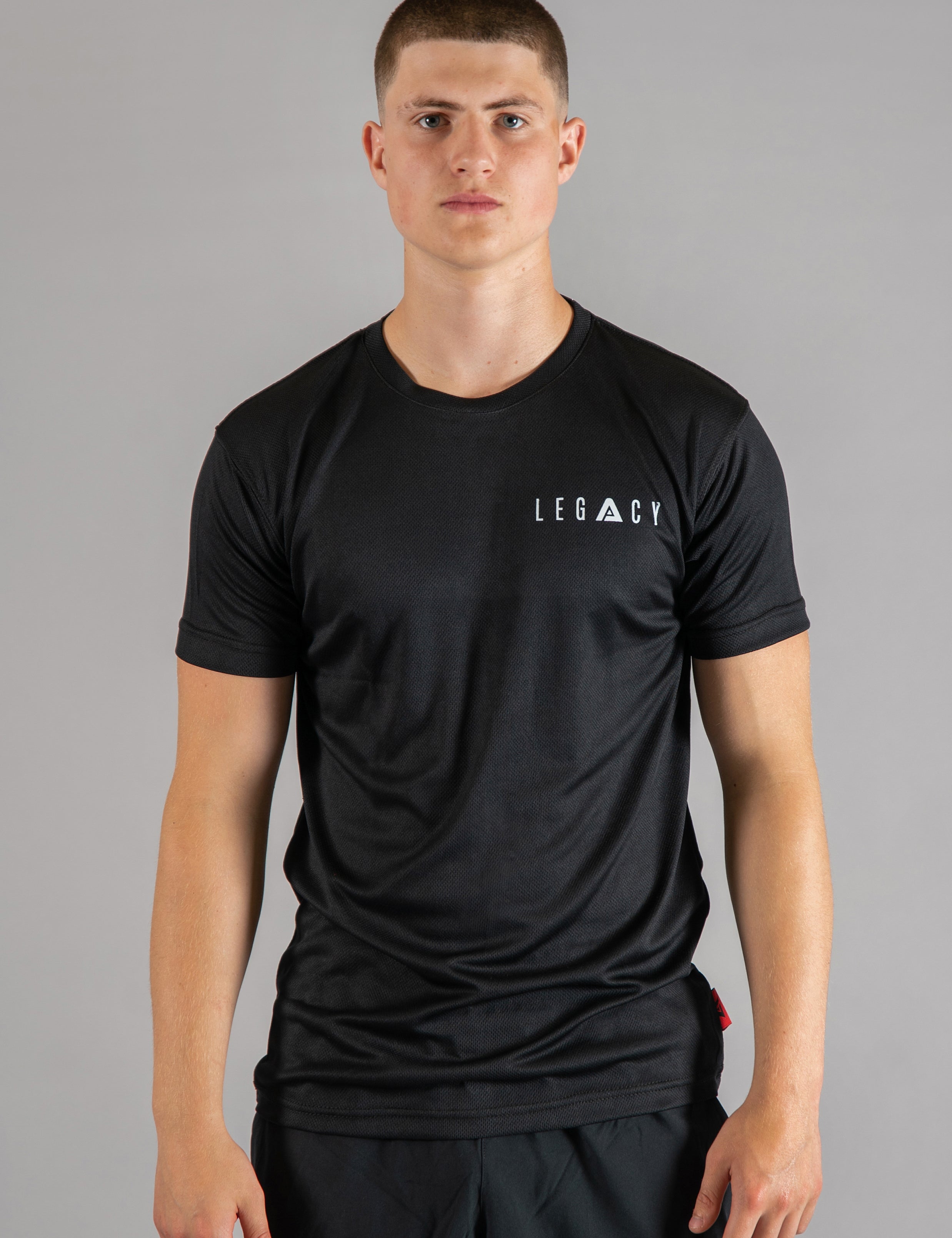 Men's black moisture wicking crewneck t-shirt with white logo.