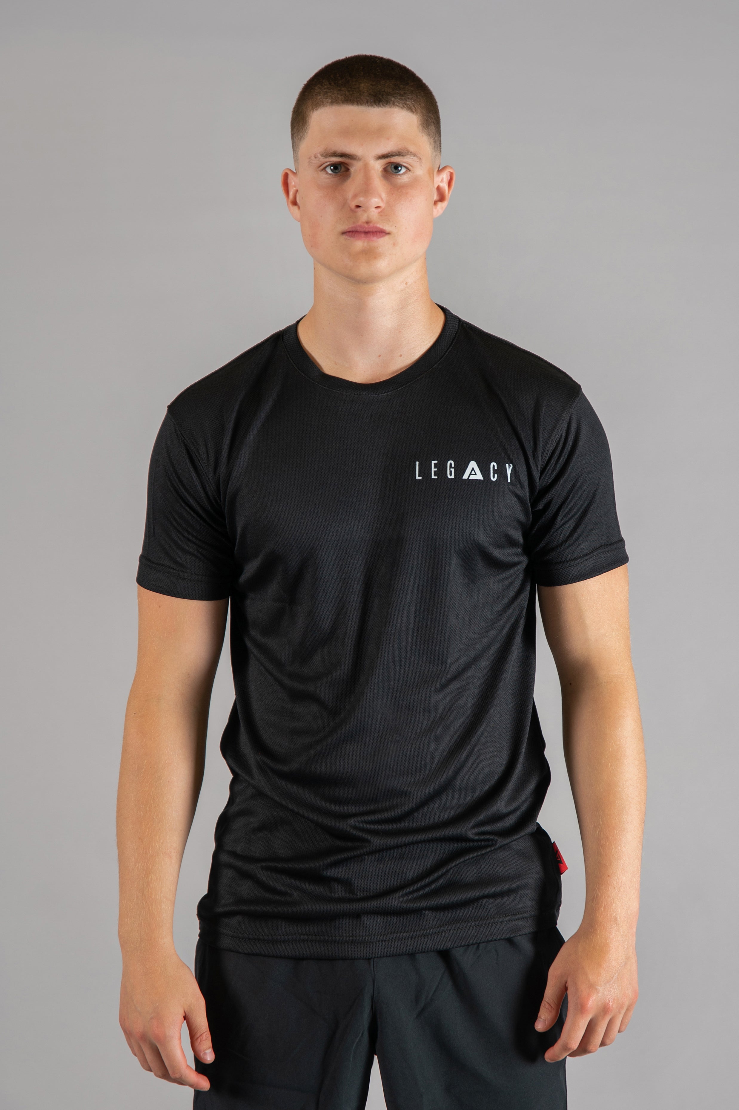 Men's black moisture wicking crewneck t-shirt with white logo.