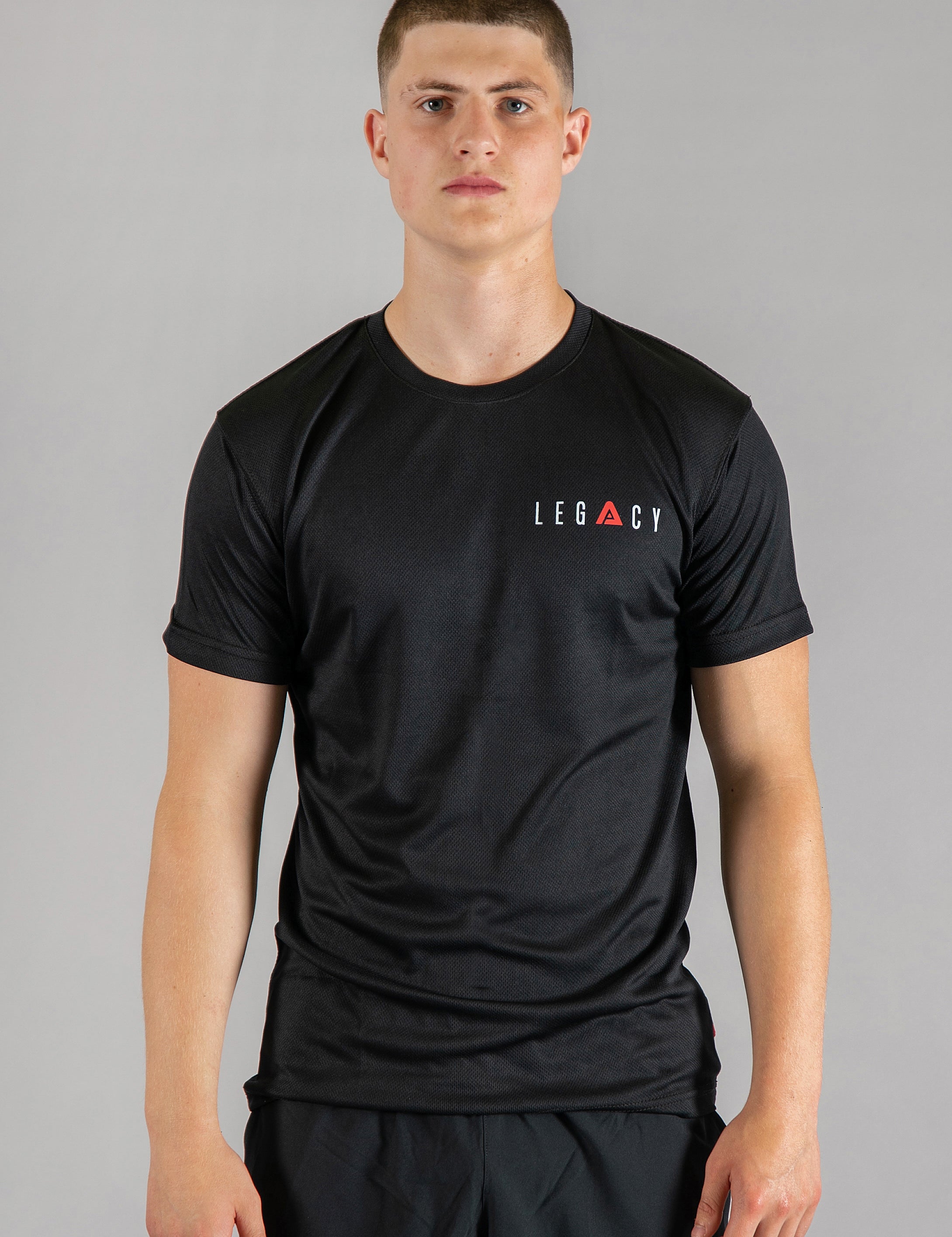 Men's black moisture wicking crewneck t-shirt with red and white logo.