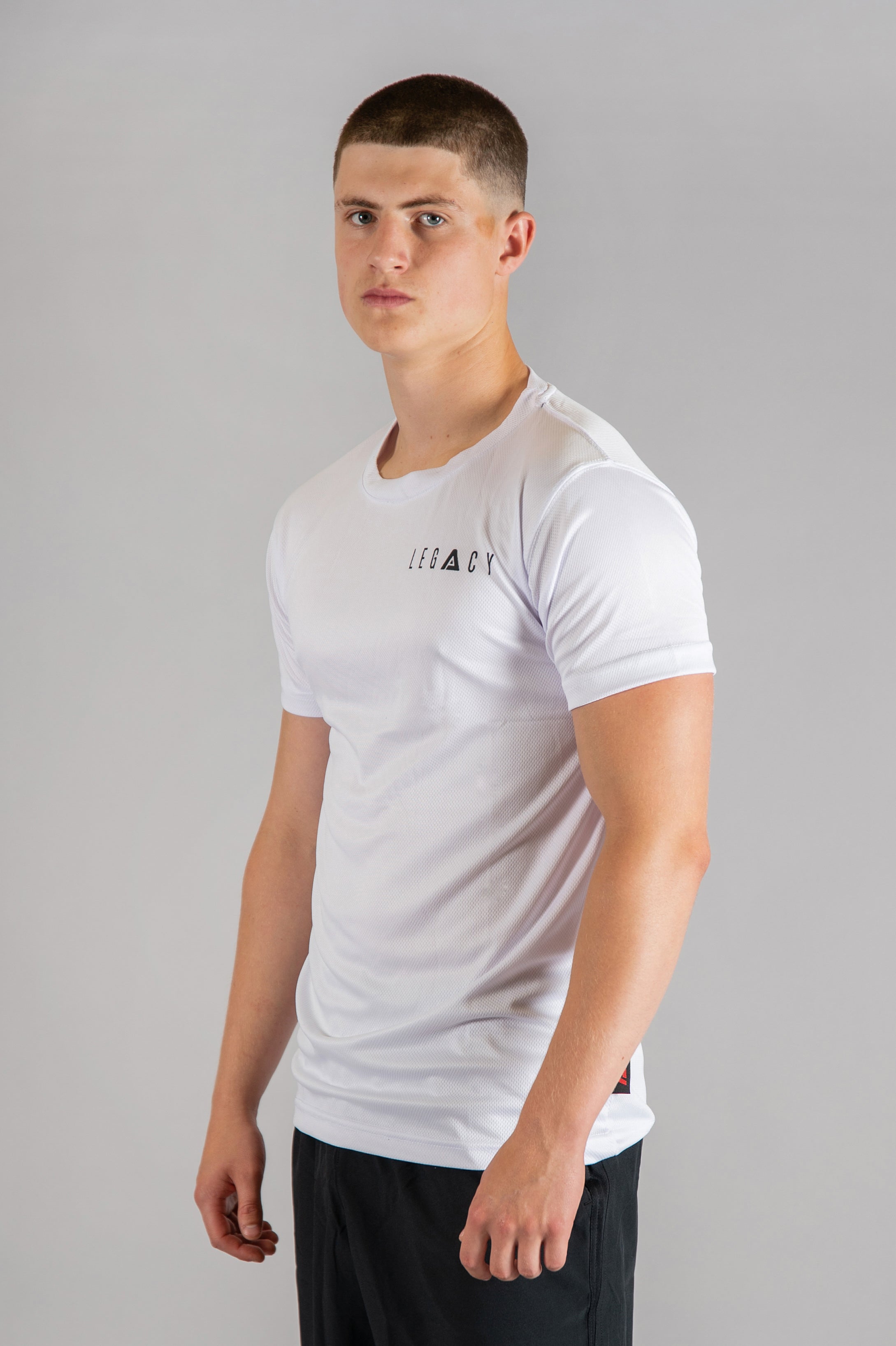 Men's white moisture wicking crewneck t-shirt with black logo.