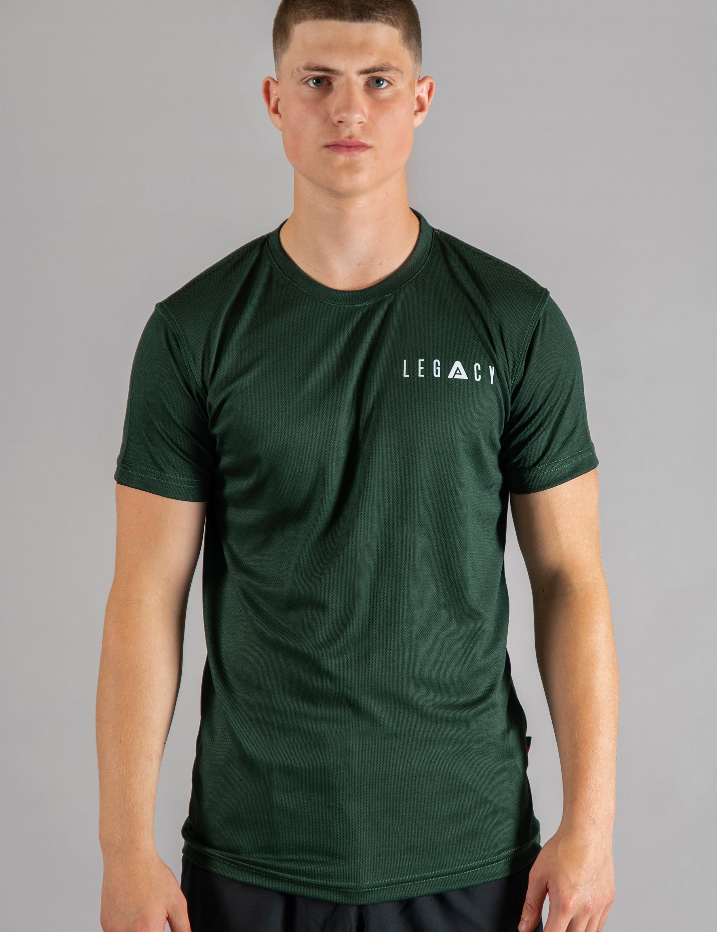 Men's forest green moisture wicking crewneck t-shirt with white logo.