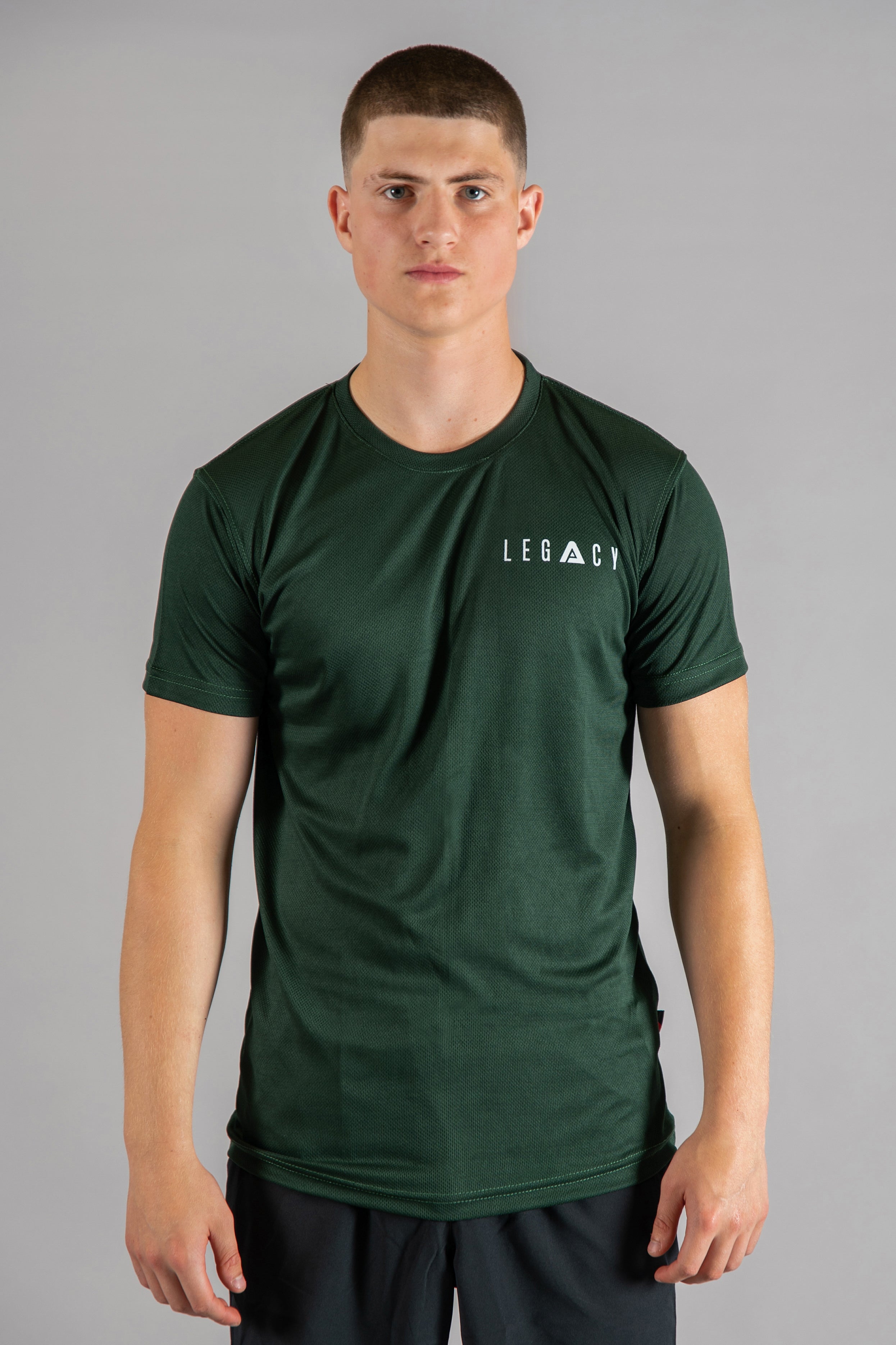 Men's forest green moisture wicking crewneck t-shirt with white logo.