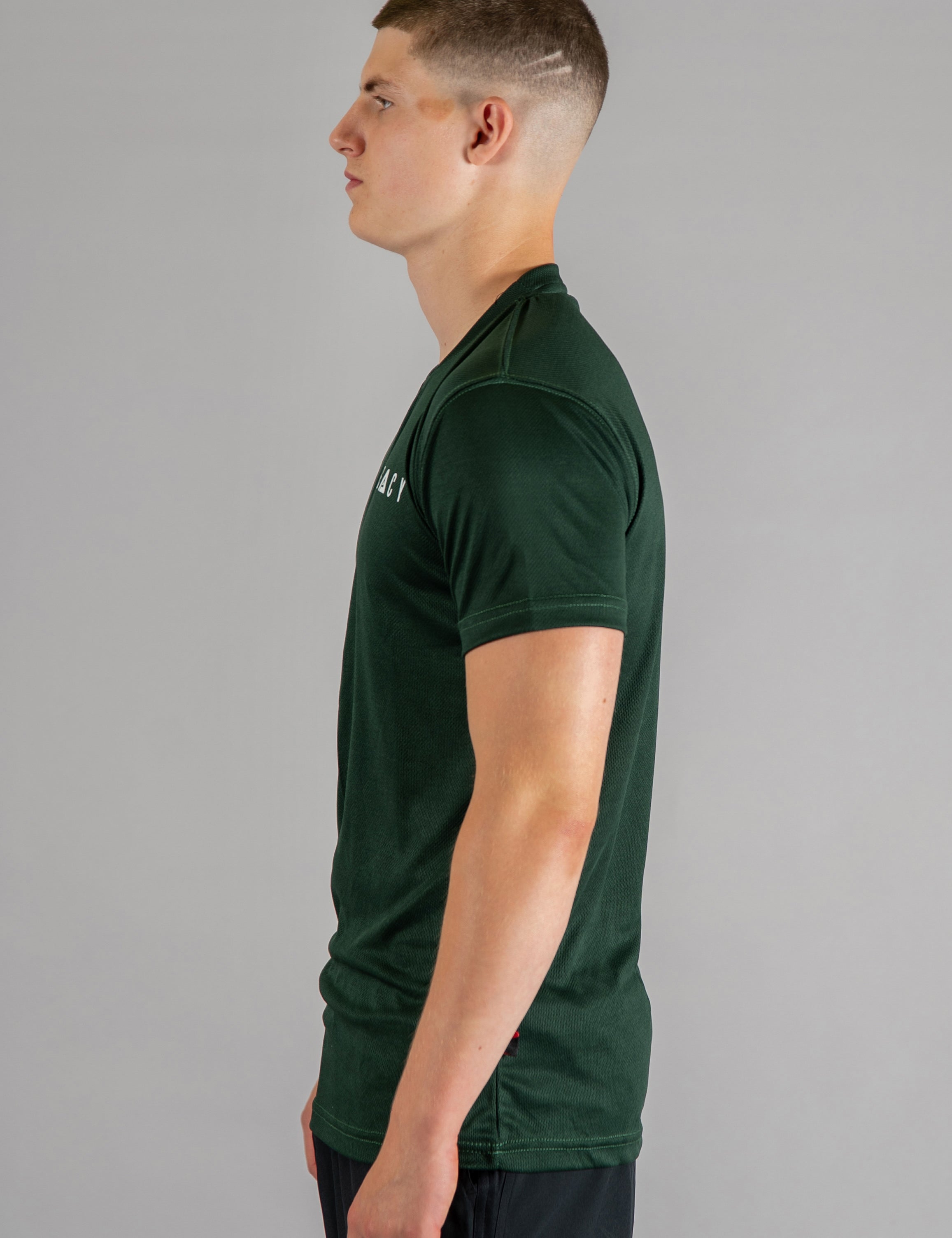 Men's forest green moisture wicking crewneck t-shirt with white logo.