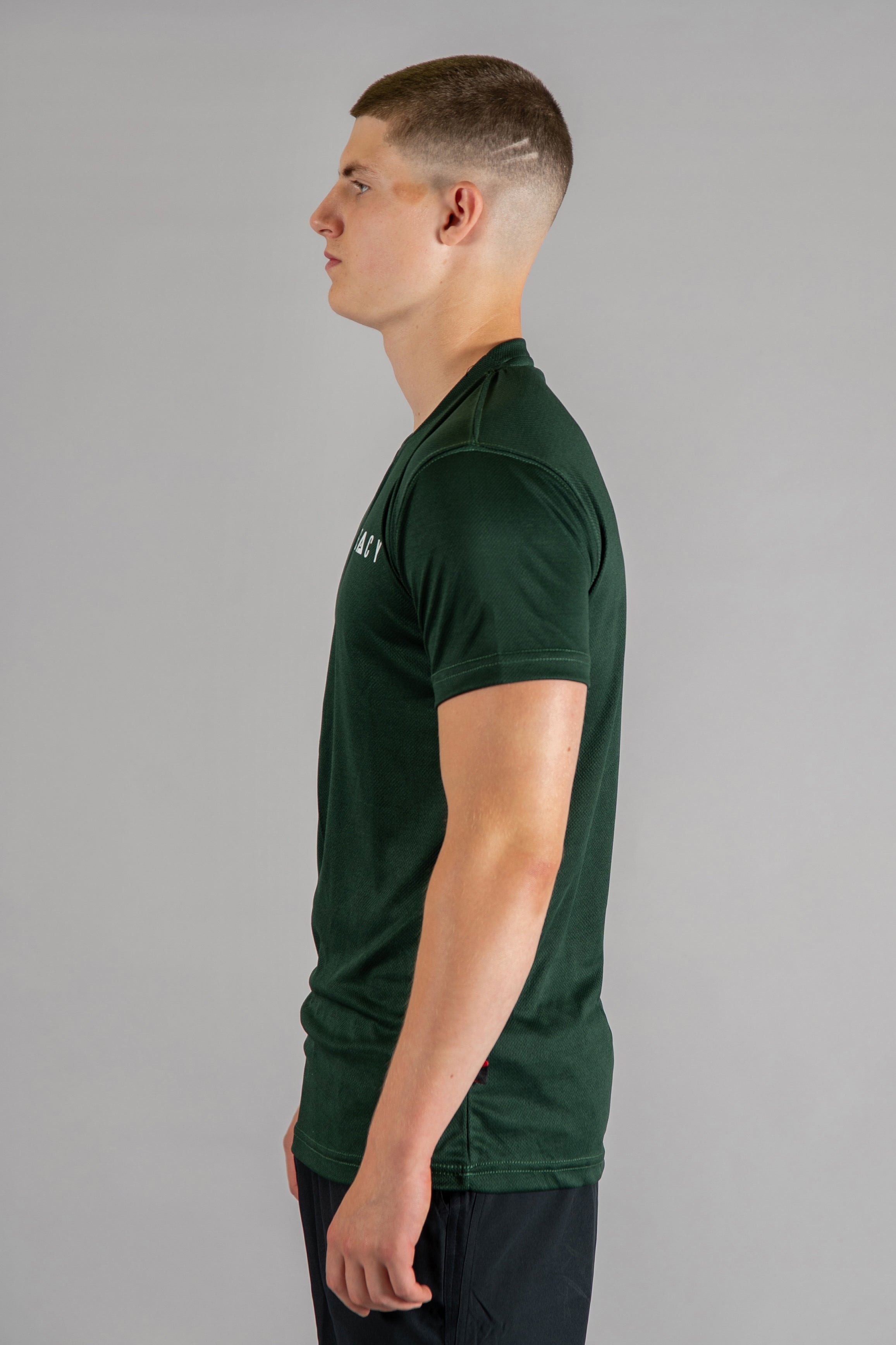 Men's forest green moisture wicking crewneck t-shirt with white logo.