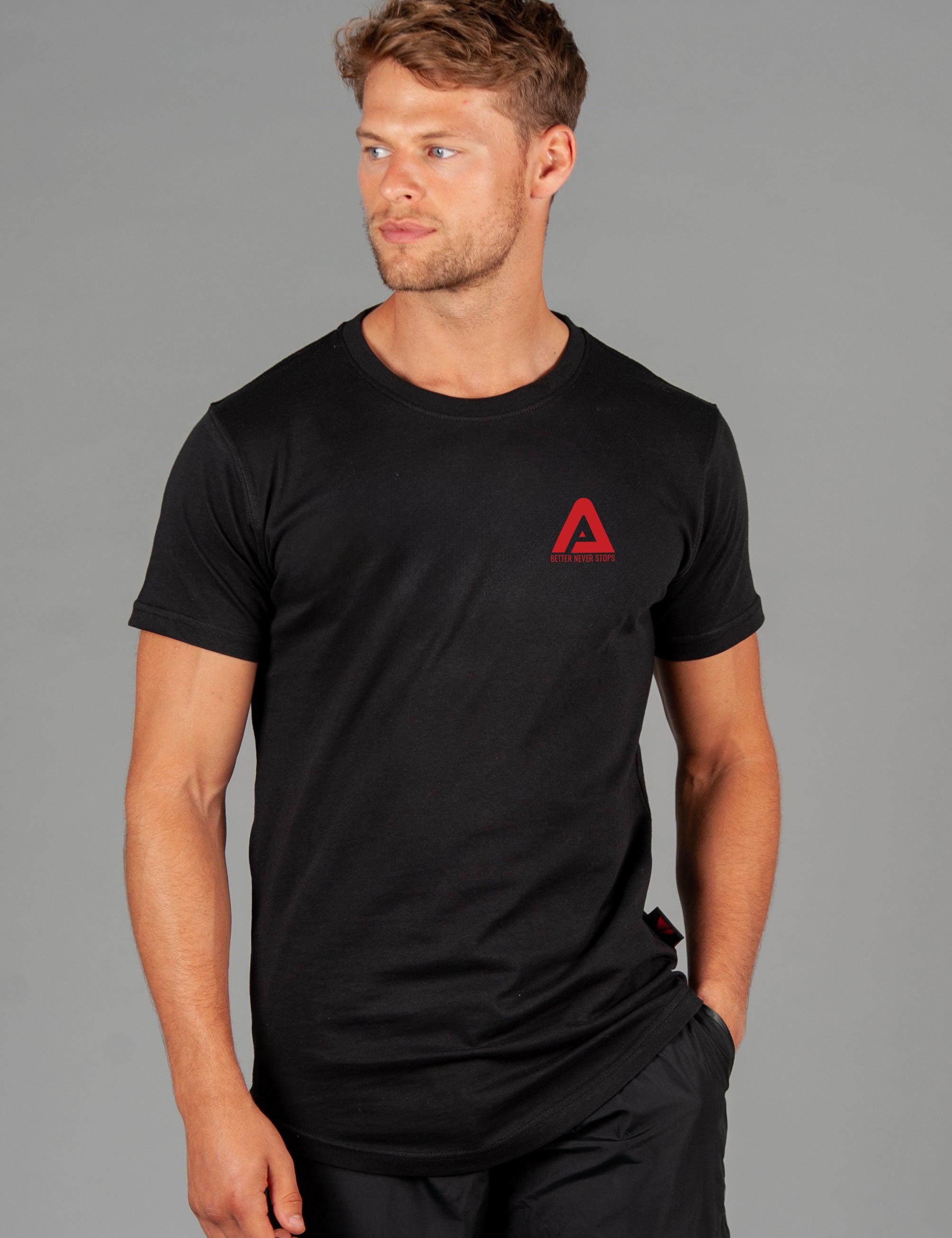 Men's black t-shirt with small red Better Never Stops logo.