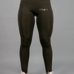 Women's olive full length workout leggings with small white hip logo.