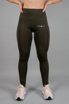 Women's olive full length workout leggings with small white hip logo.