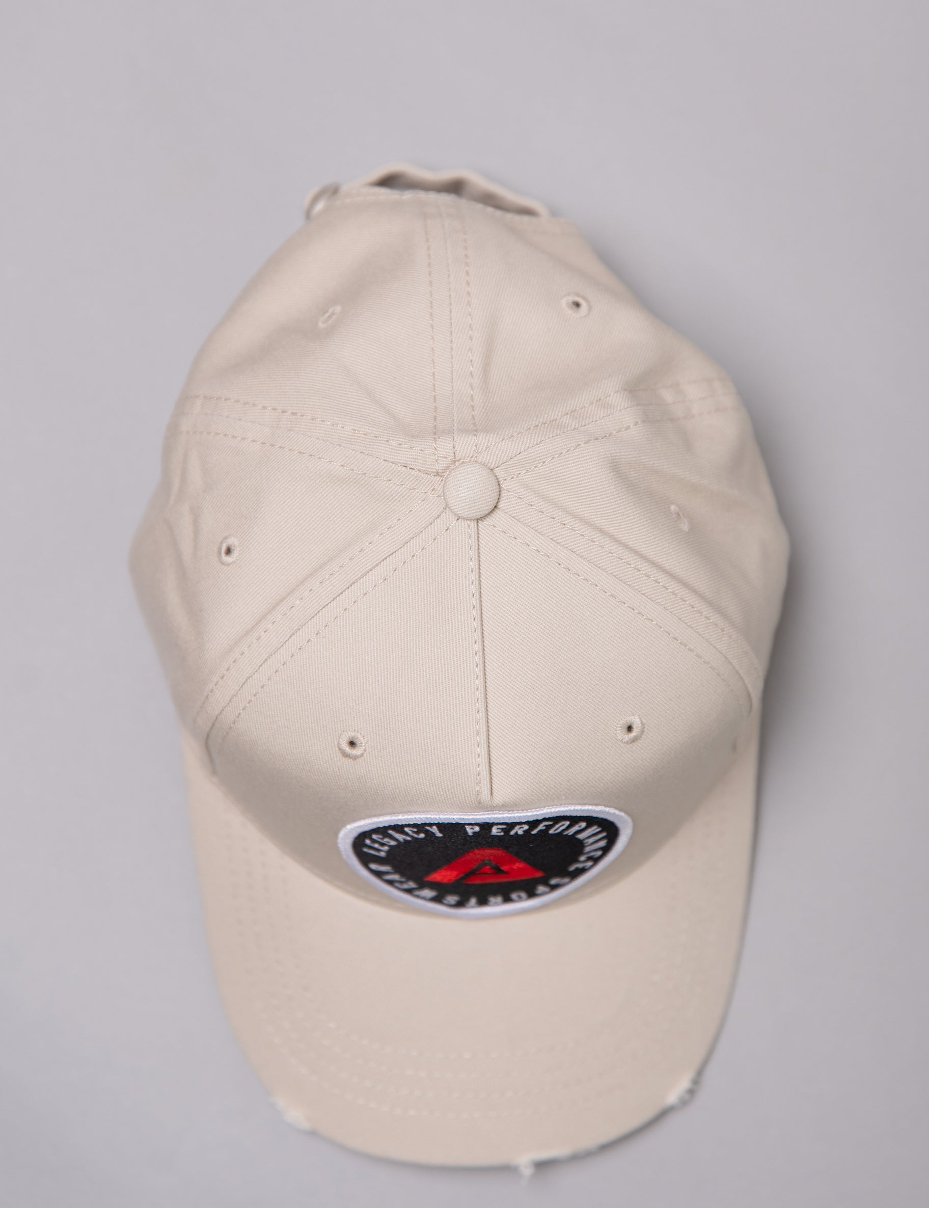 Stone Legacy baseball cap with black, white and red logo.