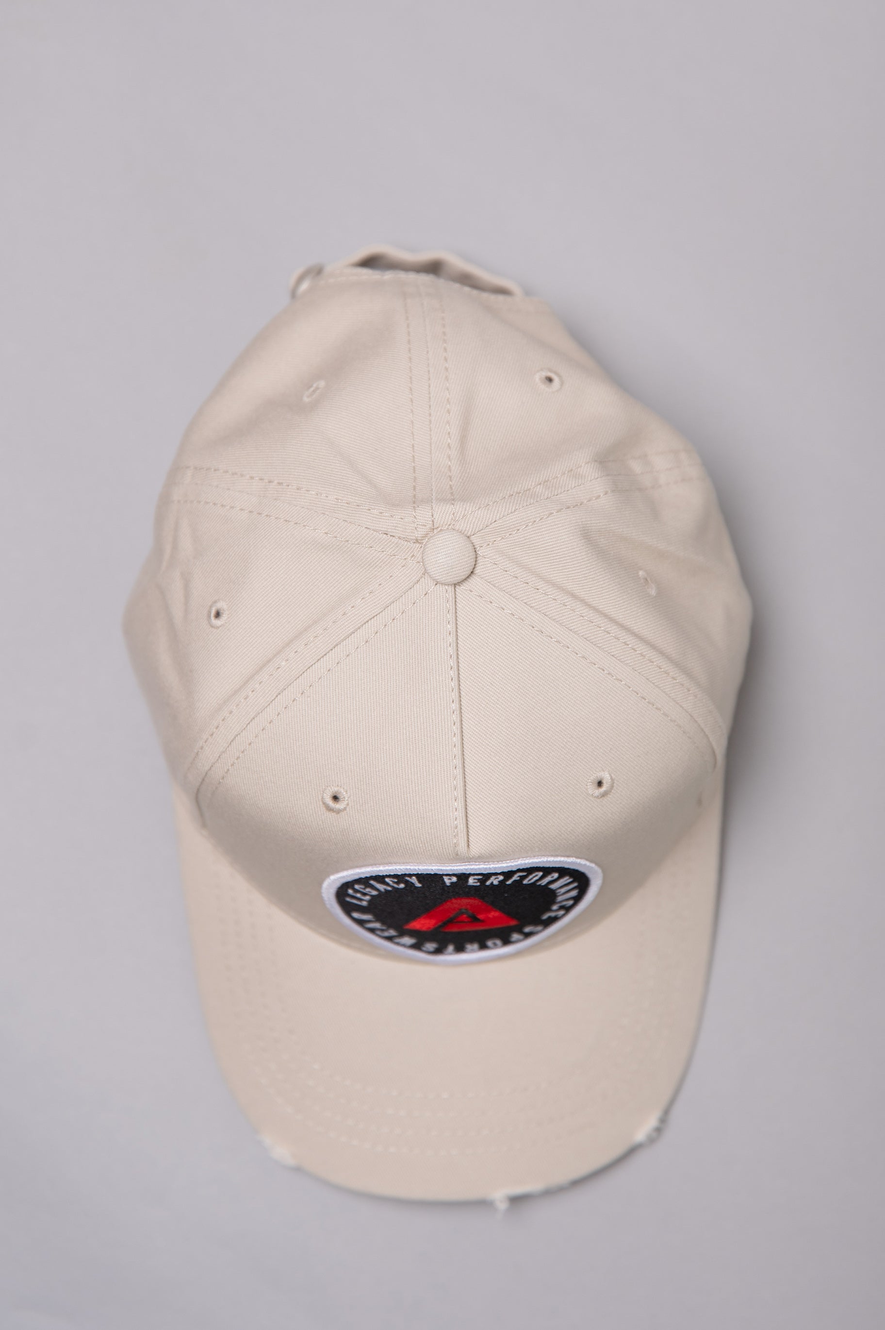 Stone Legacy baseball cap with black, white and red logo.