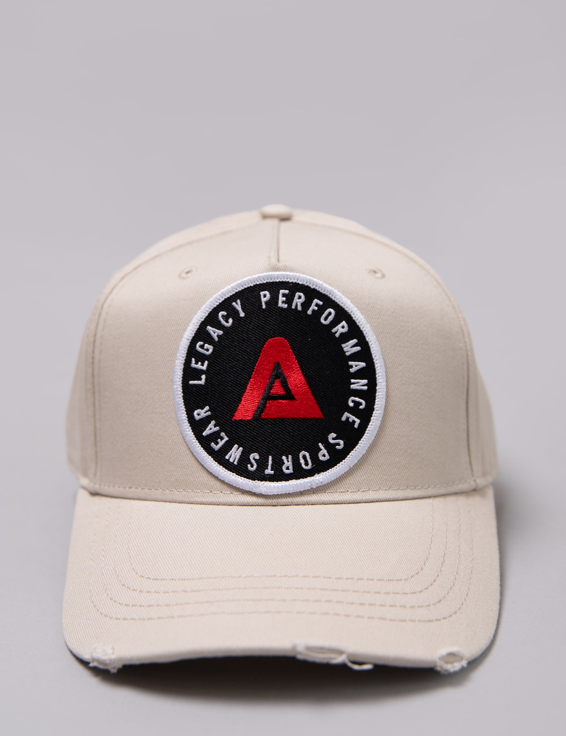 Stone Legacy baseball cap with black, white and red logo.