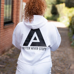 Back view of women's white cropped hoodie with black Better Never Stops logo.