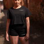 Women's black shorts with small white Legacy logo on leg.