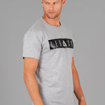 Men's grey t-shirt with black boxed Legacy logo across chest. 