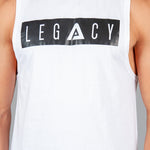 Men's white tank with black boxed Legacy logo across chest. 