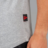 Close up of Legacy tag on men's grey tank.