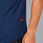 Close up of Legacy tag on men's navy tank.