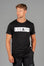 Men's black t-shirt with white boxed Legacy logo across chest. 