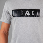 Men's grey t-shirt with black boxed Legacy logo across chest. 