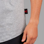 Close up of tag on men's grey t-shirt.