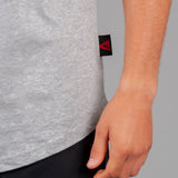 Close up of tag on men's grey t-shirt.