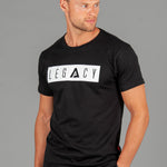 Men's black t-shirt with white boxed Legacy logo across chest. 