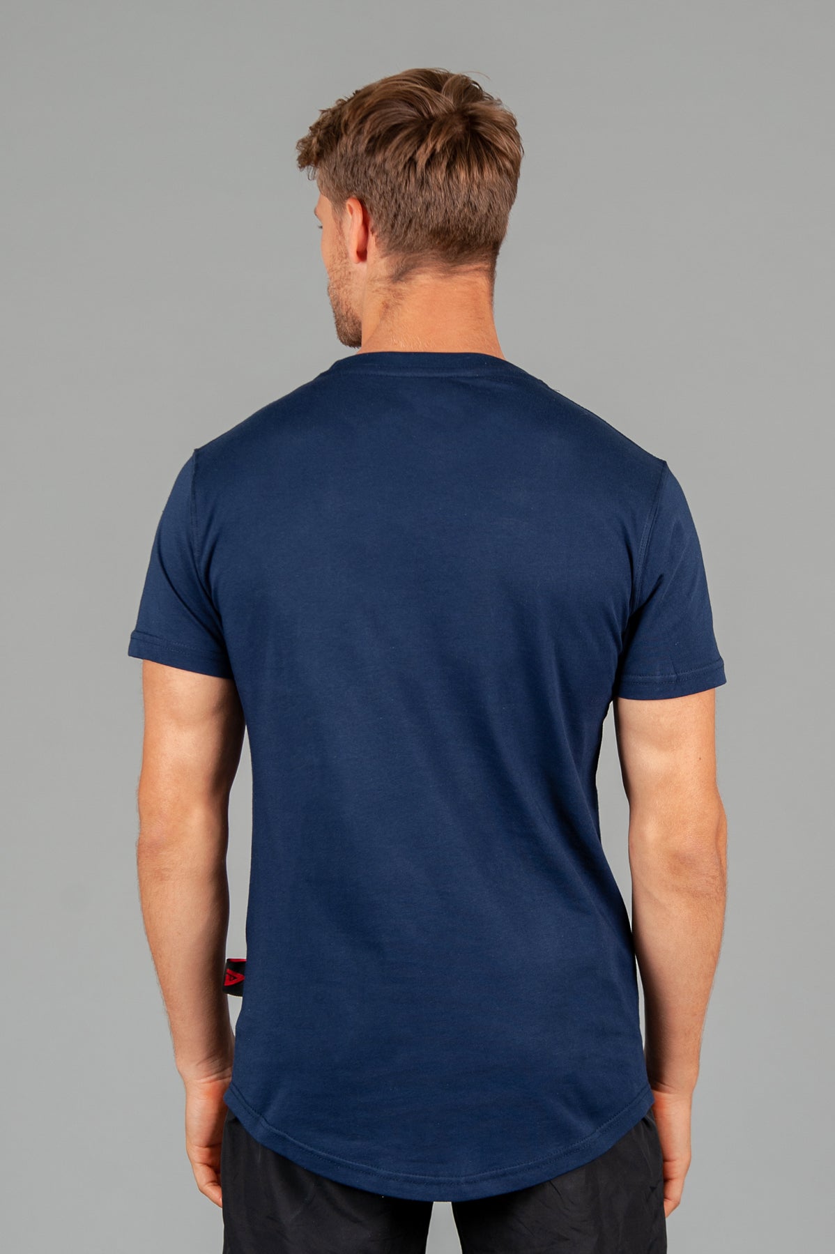 Back view of men's navy t-shirt.