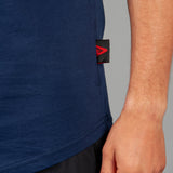 Close up of Legacy tag on men's navy t-shirt.