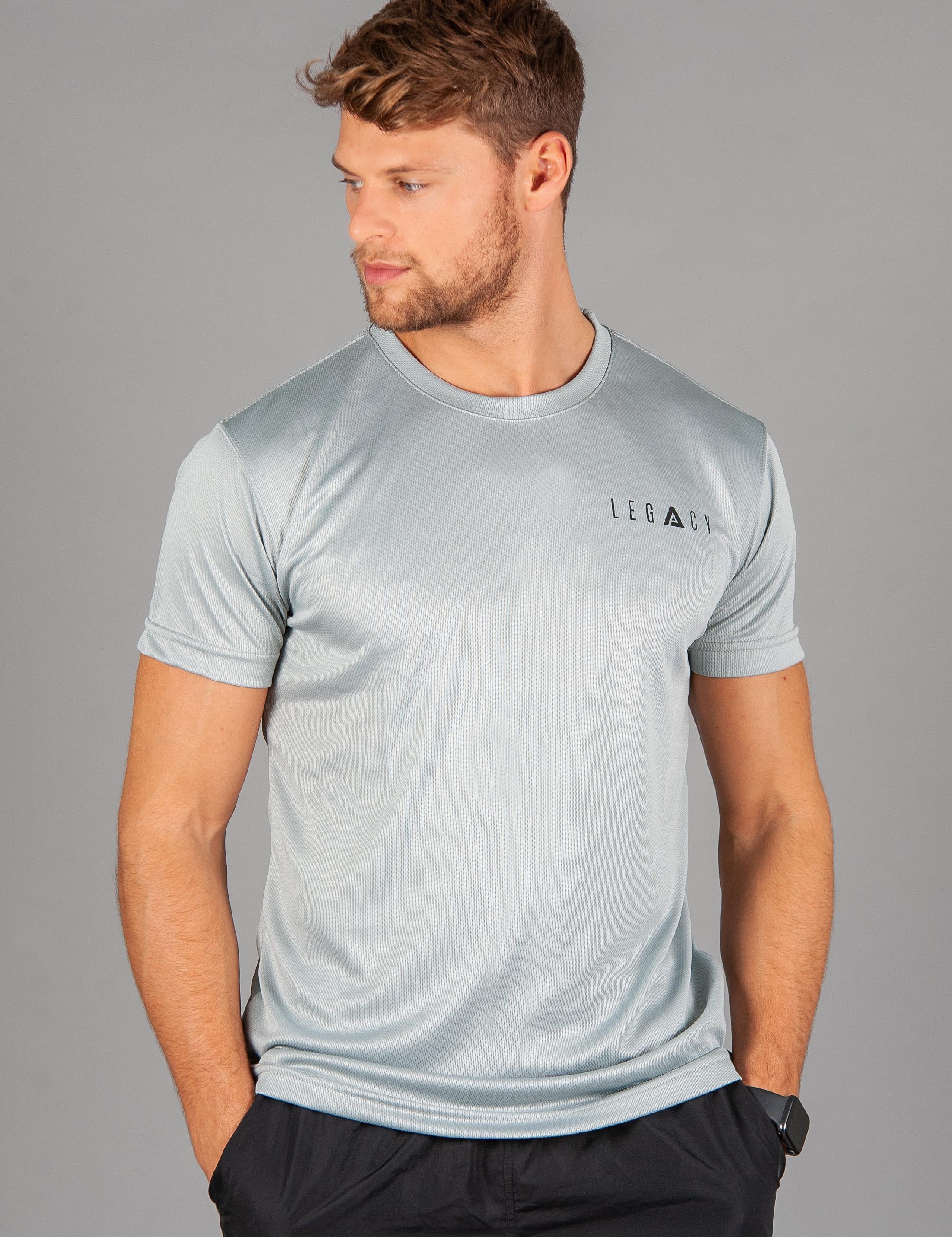 Men's silver moisture wicking crewneck t-shirt with black logo.