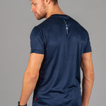 Back view of men's navy moisture wicking crewneck t-shirt with white logo.