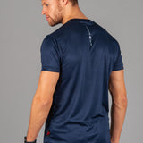 Back view of men's navy moisture wicking crewneck t-shirt with white logo.