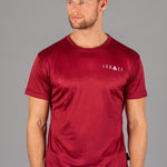 Men's burgundy moisture wicking crewneck t-shirt with white logo.