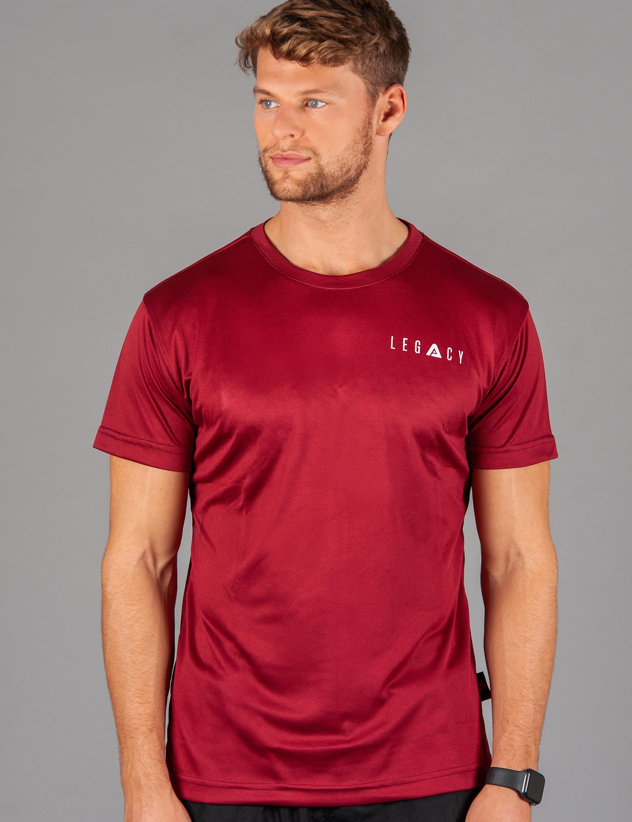Men's burgundy moisture wicking crewneck t-shirt with white logo.