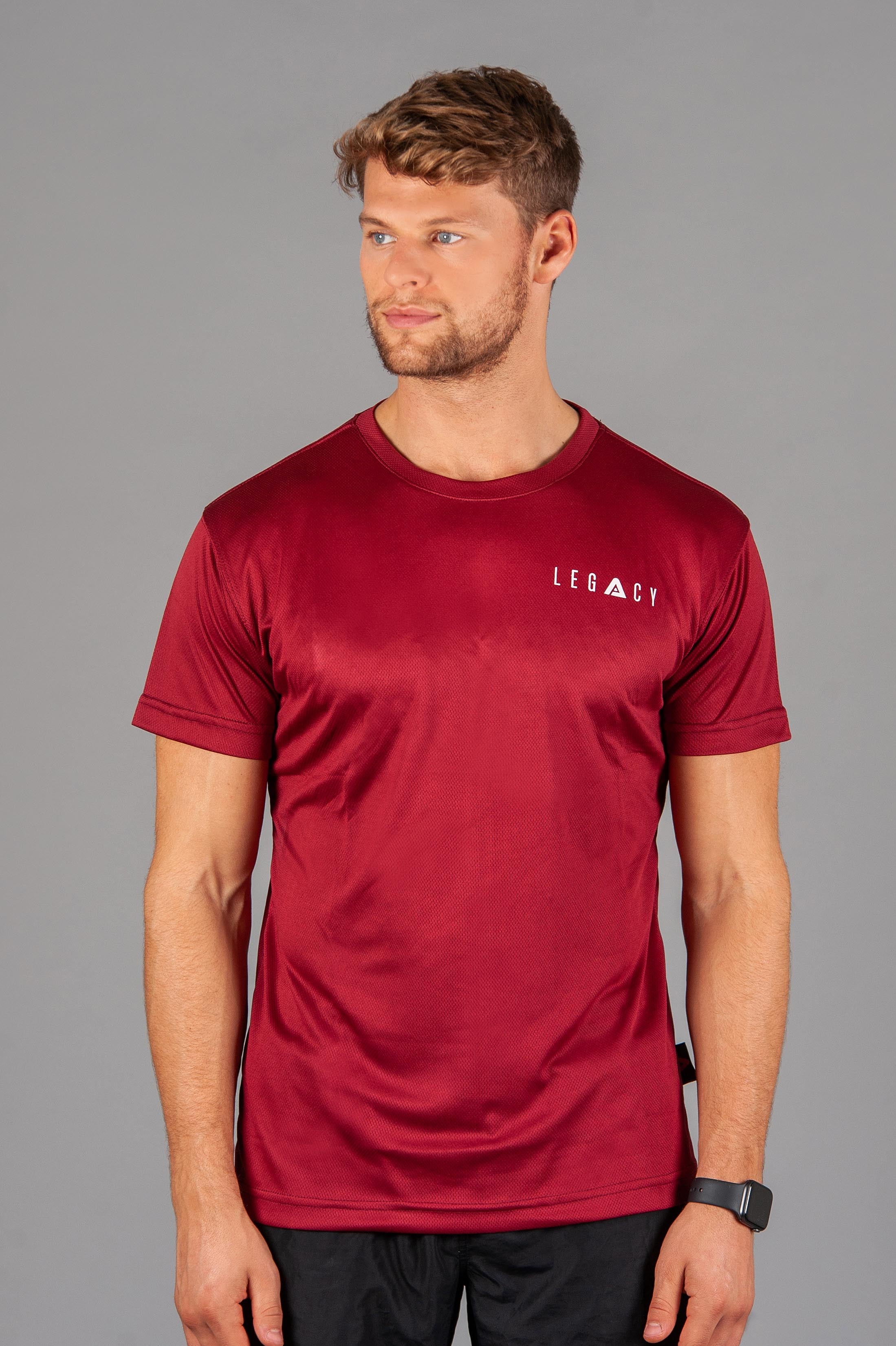Men's burgundy moisture wicking crewneck t-shirt with white logo.