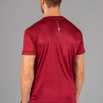Back view of men's burgundy moisture wicking crewneck t-shirt with white logo.