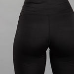 Back view of women's black bike shorts. 