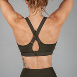 Women's olive sports bra with cross-over adjustable straps and clasp back.